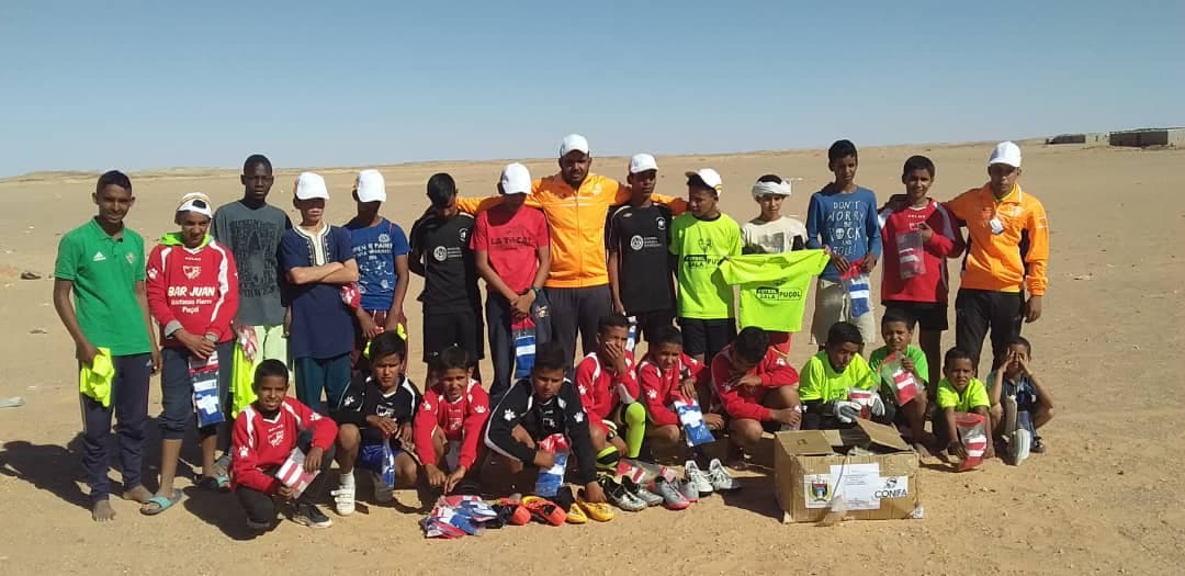 paul_c_watson's tweet photo. Excited to see boots donated by the fantastic @Boots2Africa arrive with @SahrawiFootball players in the camps in Tindouf. Most players have to brave the rock hard surface in bare feet, but like many @CONIFAOfficial members the game thrives against all the odds. https://t.co/BbmaYTv7lu