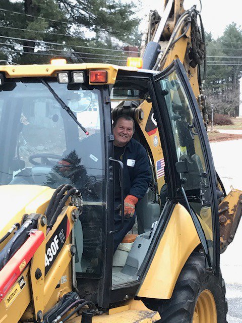 BowManager's tweet photo. Spring is here! The DPW crew is cleaning up sand and laying down mulch today at the Municipal Building. https://t.co/Fc6FLmwdTS