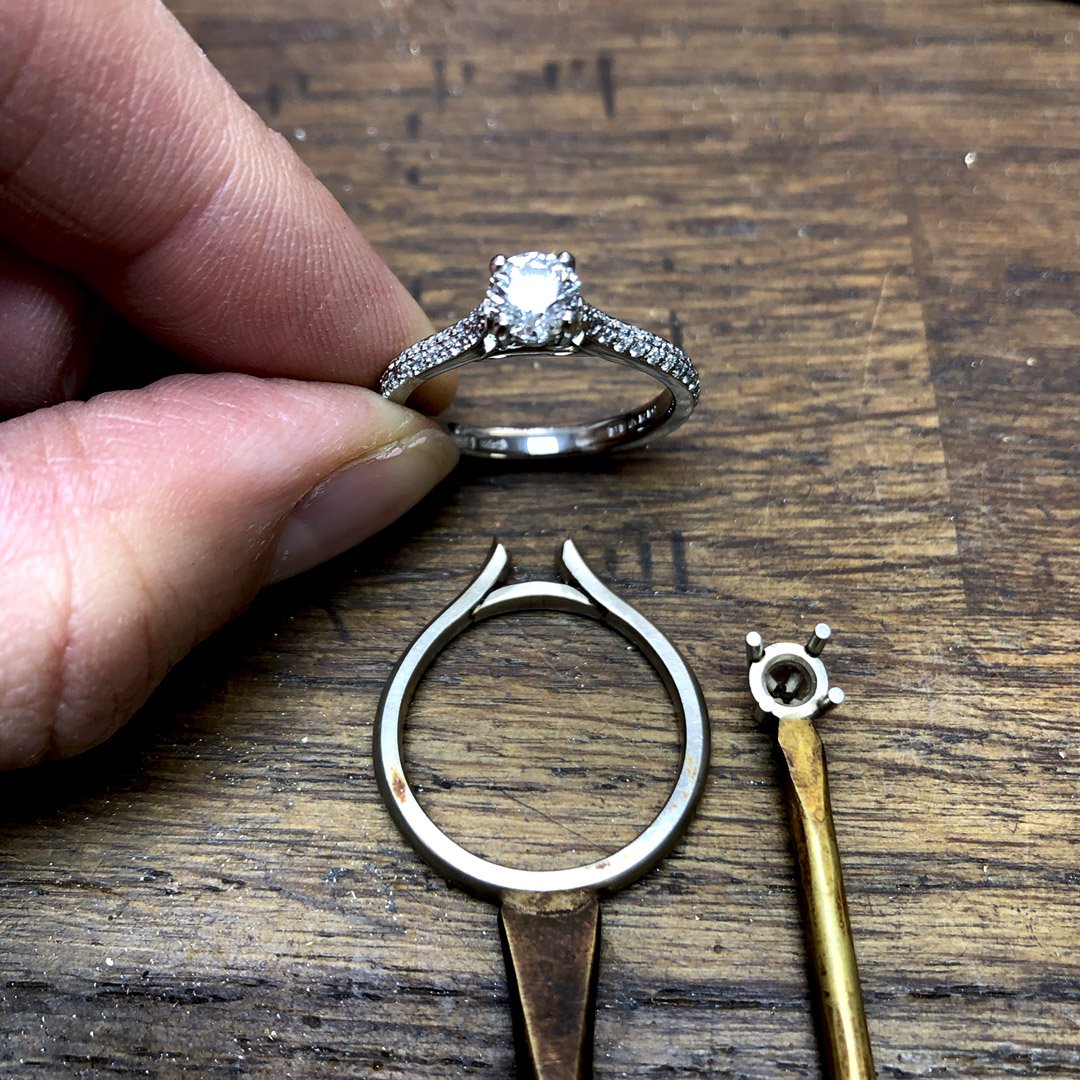 At our #jewelleryworkshop we make silver models in the traditional way to ensure each detail on our #engagementrings is perfect every time. Here is the finished #platinum and #diamond ring with pieces of the silver model below. beards.co.uk/categories/433…