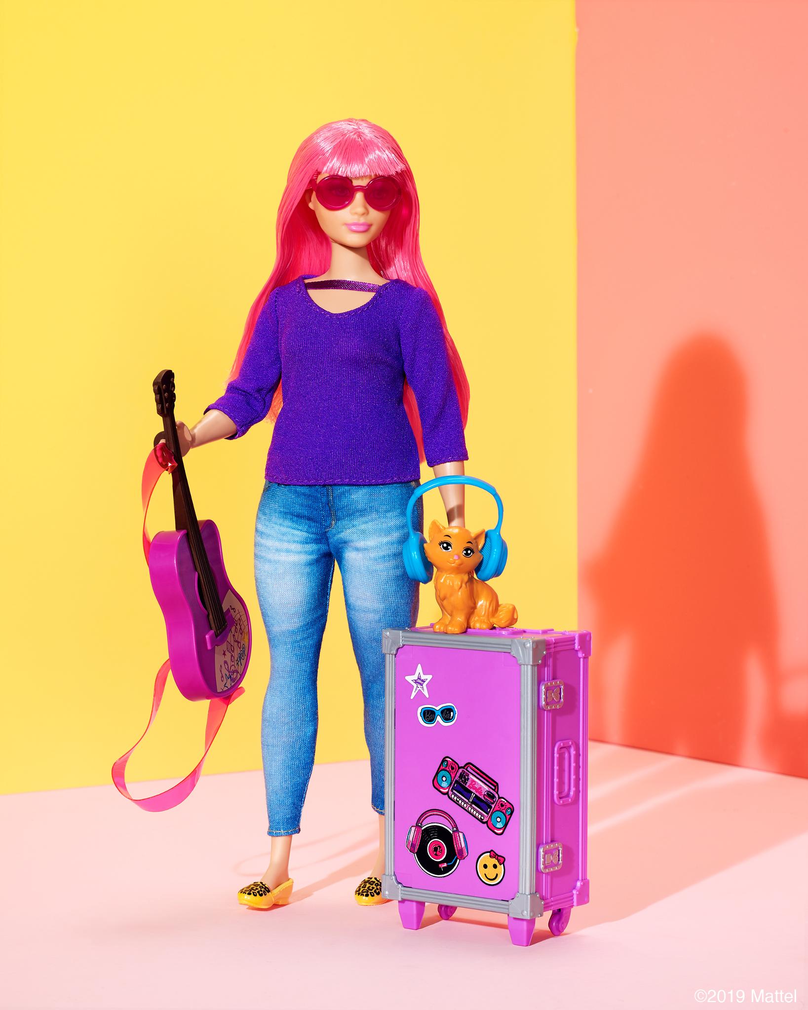 Barbie daisy travel doll and best sale accessories