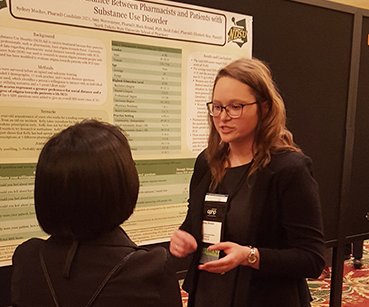 Students share their knowledge. Sydney Mosher presents research data from the ONERx program and McKenzie Hill provides data from Project ECHO ND. They're at the College of Psychiatric and Neurologic Pharmacists Annual Meeting in Salt Lake City. #NDSUexperience #NDSUtrue