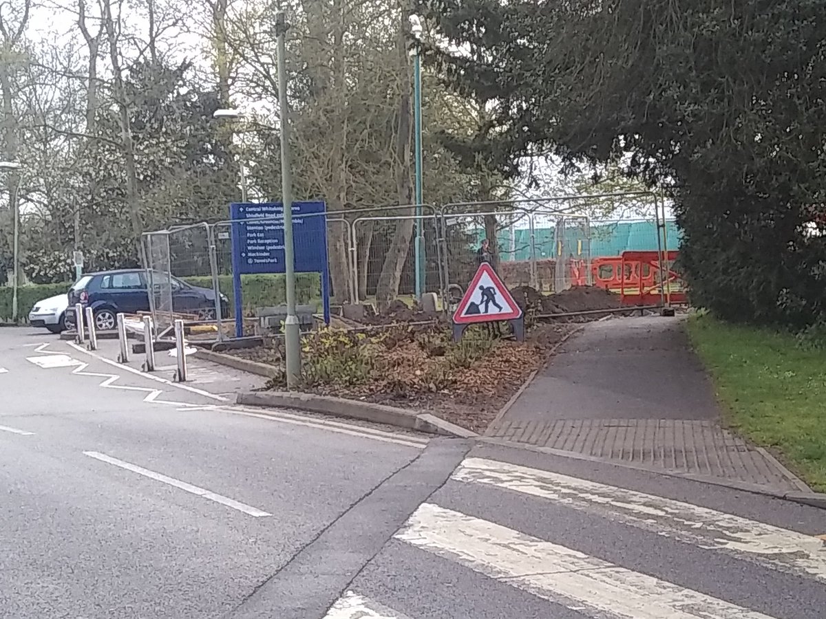 RUSUDisability's tweet photo. Today my path on and off campus was blocked so I had to go onto the road to get to the library and home again. Since I had walking sticks and I was unsteady on my feet, it was really unsafe and I'm lucky no cars or bikes were coming. #LetMe travel around campus safely https://t.co/DkIWmKZqmI