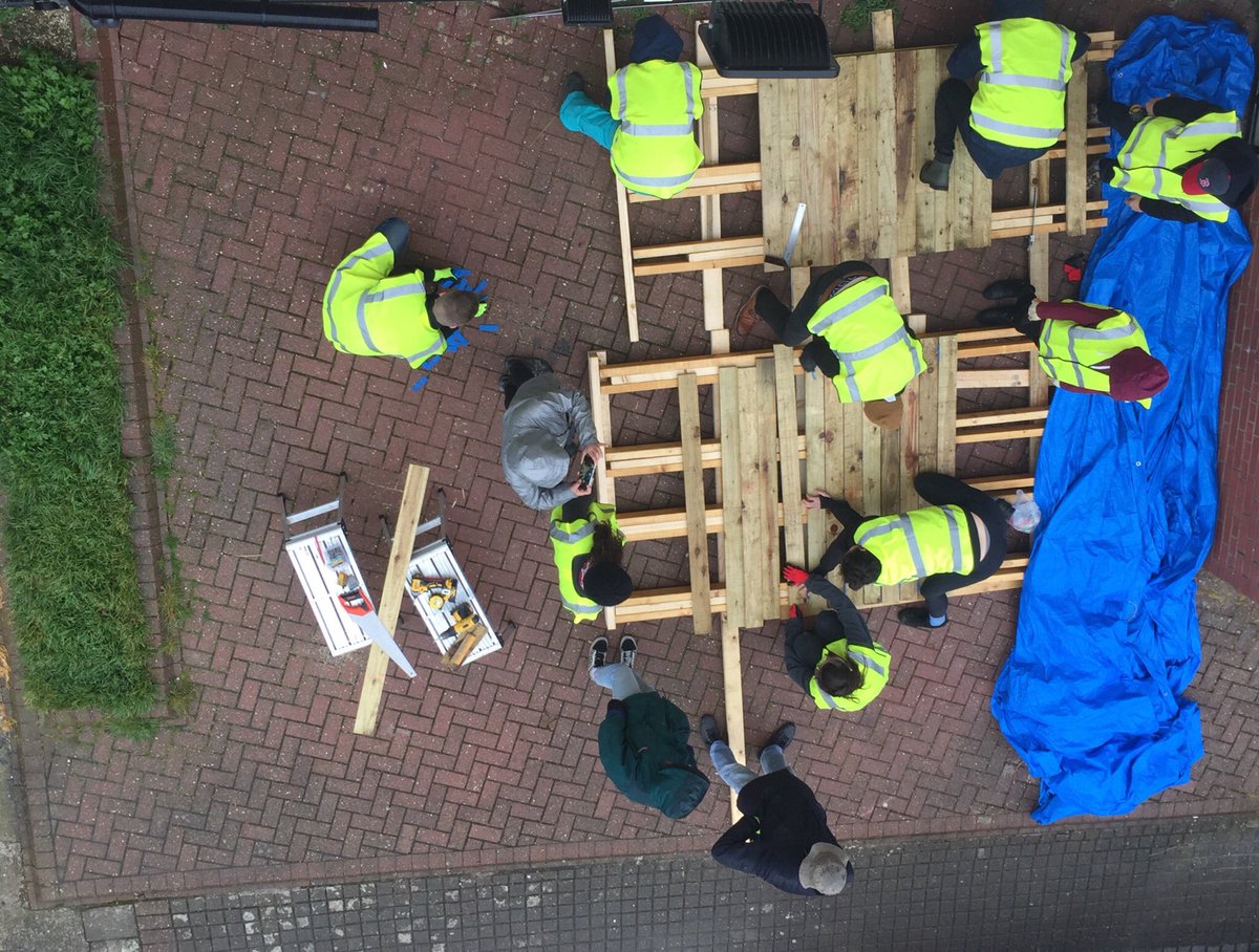 LoynCo's tweet photo. A great start to the final week with our @WSofArchi Vertical Studio students. Gaining experience from our lovely experienced contractor Ray Jones to build the #bikeshelter they have designed. #practiceexperience https://t.co/6R9xQR6f24