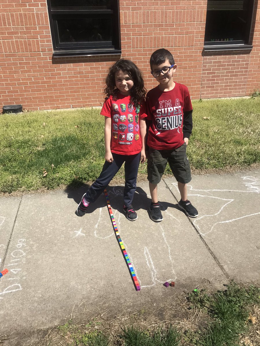 Practiced using non-standard units of measurement (connecting cubes) to measure the outlines of our classmates on this beautiful spring day!