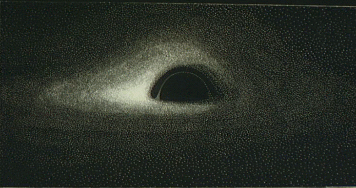 sciam's tweet photo. French astrophysicist Jean-Pierre Luminet was the first to accurately visualize a black hole. In 1978, he used punch cards to write a computer program calculating the appearance and then reproduced the image by hand using India ink on Canson negative paper https://t.co/igHOhdHKh0 https://t.co/sm03kuMJr8