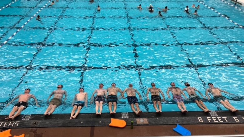 Dads of synchronized swimmers start Manitoba's only all-men's team cbc.ca/1.5090611