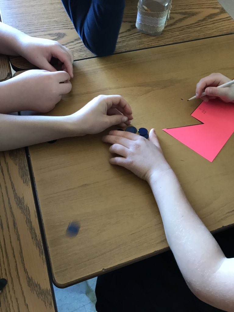 MsGrieco's tweet photo. Fractions of a set, students represented the fractions they noticed in their set of counters! They recorded their fraction using pictures, numbers (standard fractional notation) or words(one tenth). 🤓#fractionsofaset #introtofractions @stgabrielhcdsb @HCDSB https://t.co/hLIlg0s4Cw
