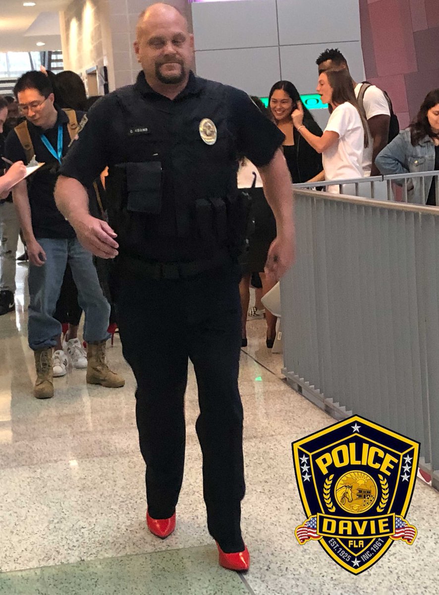 DaviePolice's tweet image. The "Walk a Mile in Her Shoes" event at @NSUFlorida was held to raise awareness about the serious causes, effects, and remediations to men's sexualized violence against women. Members from the #DaviePolice put on the red shoes and walked!
