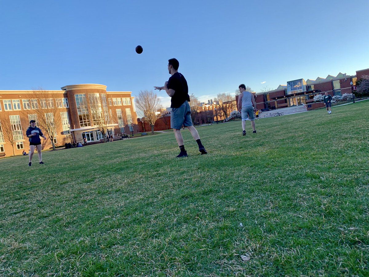 BUSFClub's tweet photo. The nice weather is among us! BUSF got out on the quad to toss the football 🏈 and enjoy the sunshine. ☀️ #stayhealthy #strengthandfitness https://t.co/UBZSNkFtvg