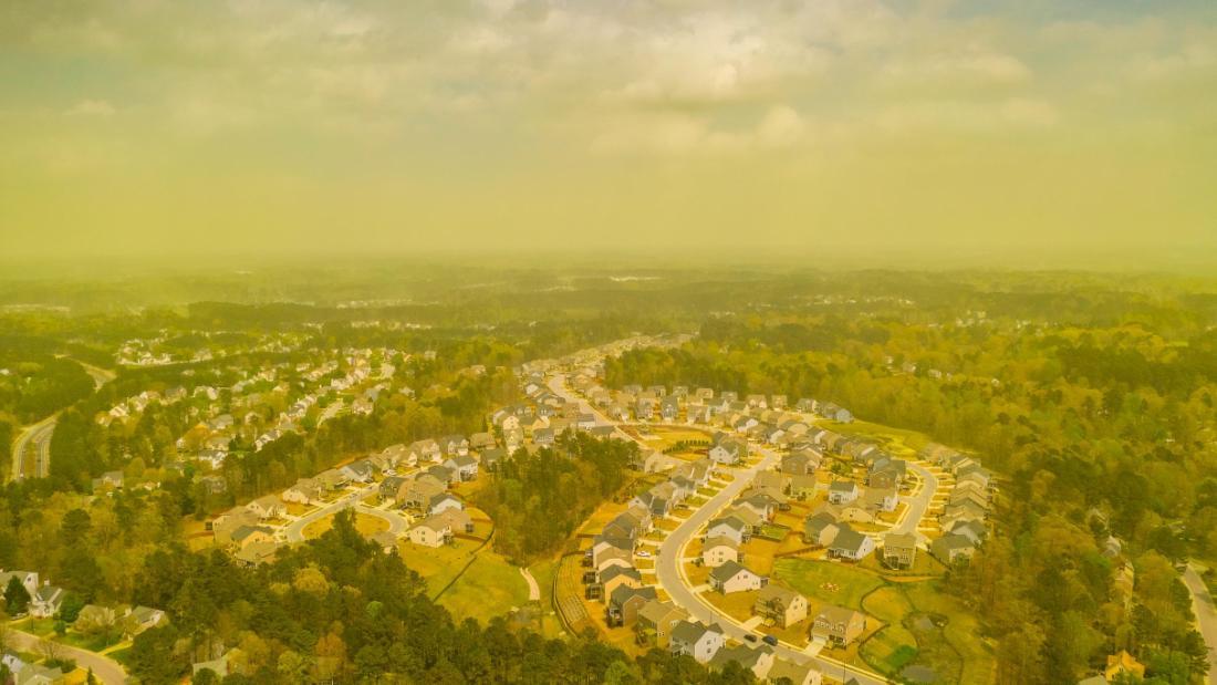 CNN's tweet photo. A photographer used a drone to capture aerial images of a pollen cloud hovering over Durham, North Carolina https://t.co/GokOQ68VoG https://t.co/YzQl1DSF8T
