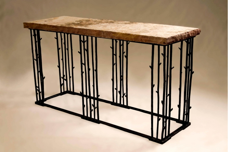 Unique Abstract Wood &amp; Iron Side Table

See more here: buff.ly/2VaSwM2 #IronSideTable #SideTable #Ironwork #HGDesignIdeas