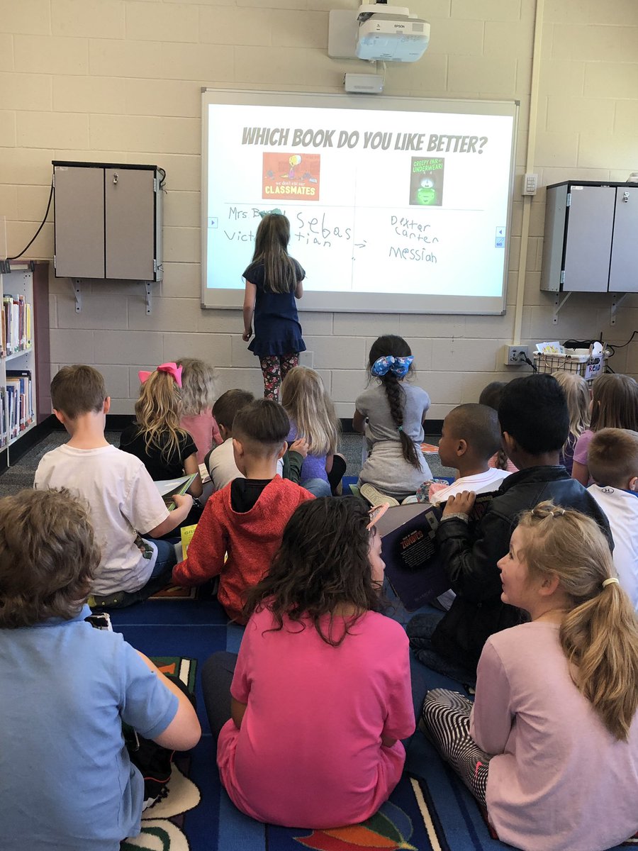fes_media's tweet photo. Our first book battle of the year! First grade is already choosing their favorite book. #falconsread #literacyfirst #feslearningcommons https://t.co/7HftUnrjbD