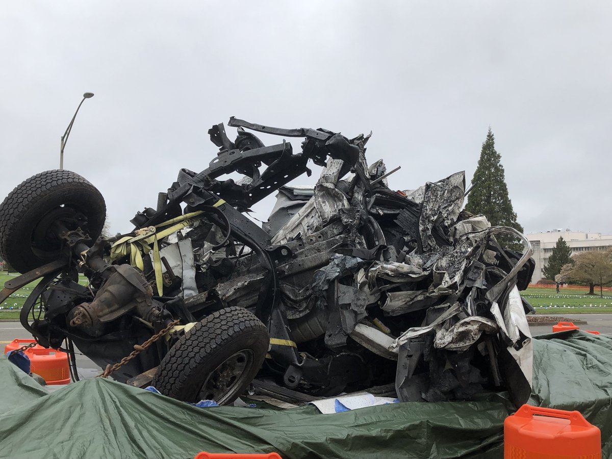 What's left of our work truck destroyed in a work zone crash on SR 3 in March. It's part of a display outside our HQ building in Olympia. Read more of the story in our blog: wsdotblog.blogspot.com/2019/04/horrif… #NWZAW #Orange4Safety #GoOrangeDay