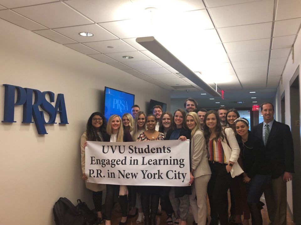 kguiver's tweet photo. @PRSSANational thank you so much for sharing your insights with us in your office today. it was such an honor, plus you guys have the best view from your balcony. hope you love this cheesy sign as much as we do #UVUPRSSA #PRSA https://t.co/bNX97sw6XI
