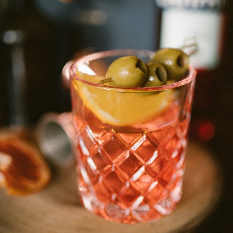 Meet our take on the Italian classic - The Negroni. A perfectly balanced concoction - and firm favourite the world around. Consisting of layers of Old Raj Gin, Campari, QuinQuina and Olive Oil, it is the perfect tipple for Spring nights.

View Menu - bit.ly/2SzBie2