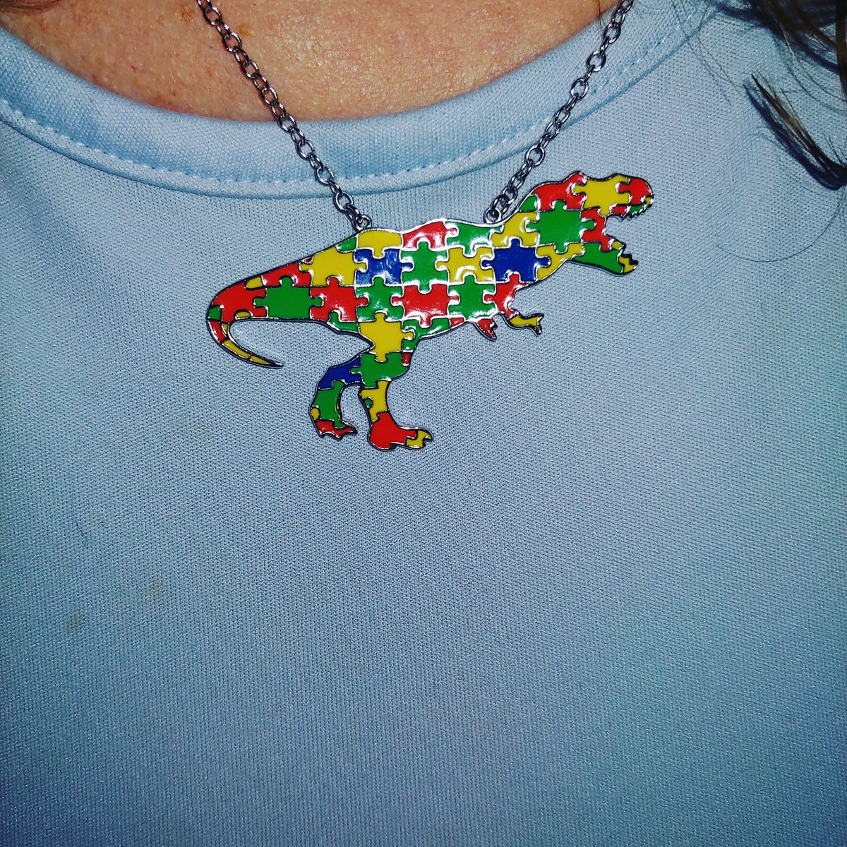 42wolves's tweet image. I love this puzzle piece dinosaur necklace. #svahasmiles