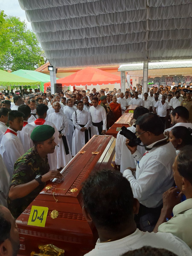 NavamaniLK's tweet image. Mass funeral commences at Katuapitiya St. Sebastian church, the scene of the heinous terrorist attack