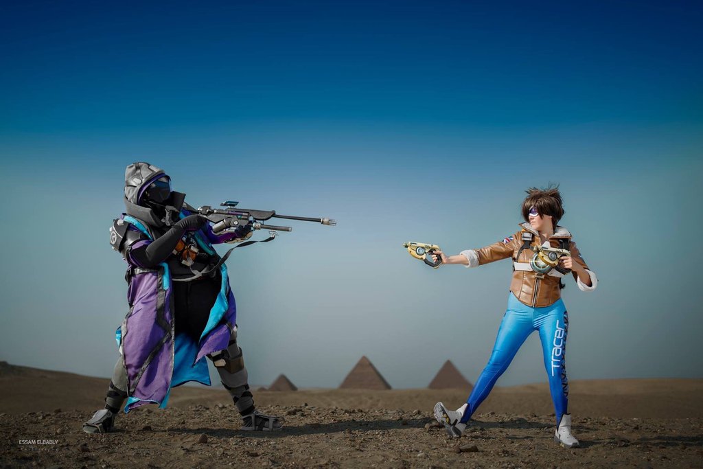 hello_angel_a_'s tweet photo. Fight me :,) #annacosplay =@waynesworkshop and #tracercosplay is @hello_angel.a 

The heat in egypt really got to me that day and i was quite swollen of pain and migraine but im happy i joined because the pictures look sooooo damn cool!! 

Pic by @essamelbably ❤️ https://t.co/99xgjWDwxf