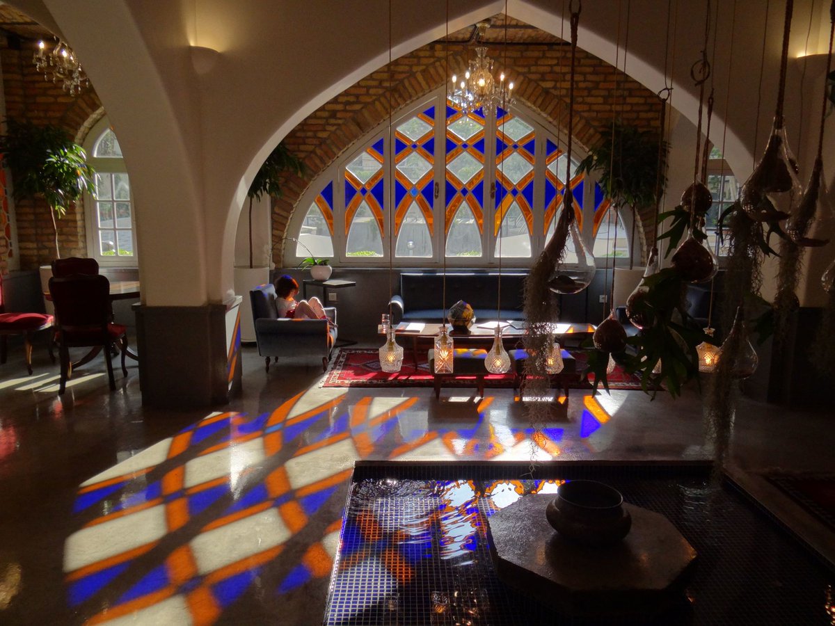 lena_spath's tweet photo. Studio Davazdah by Niloofar Niksar transforms a 1960s home in Tehran into a cultural hub including tradition elements like multi-colored windows and pointed arches. https://t.co/km41K3VUYM https://t.co/O7GzSEVwIe