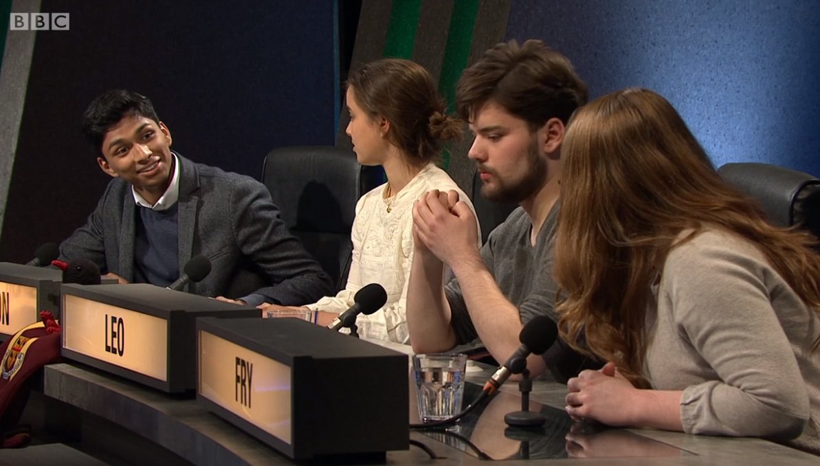 The Teddy Hall University Challenge team confer over an answer