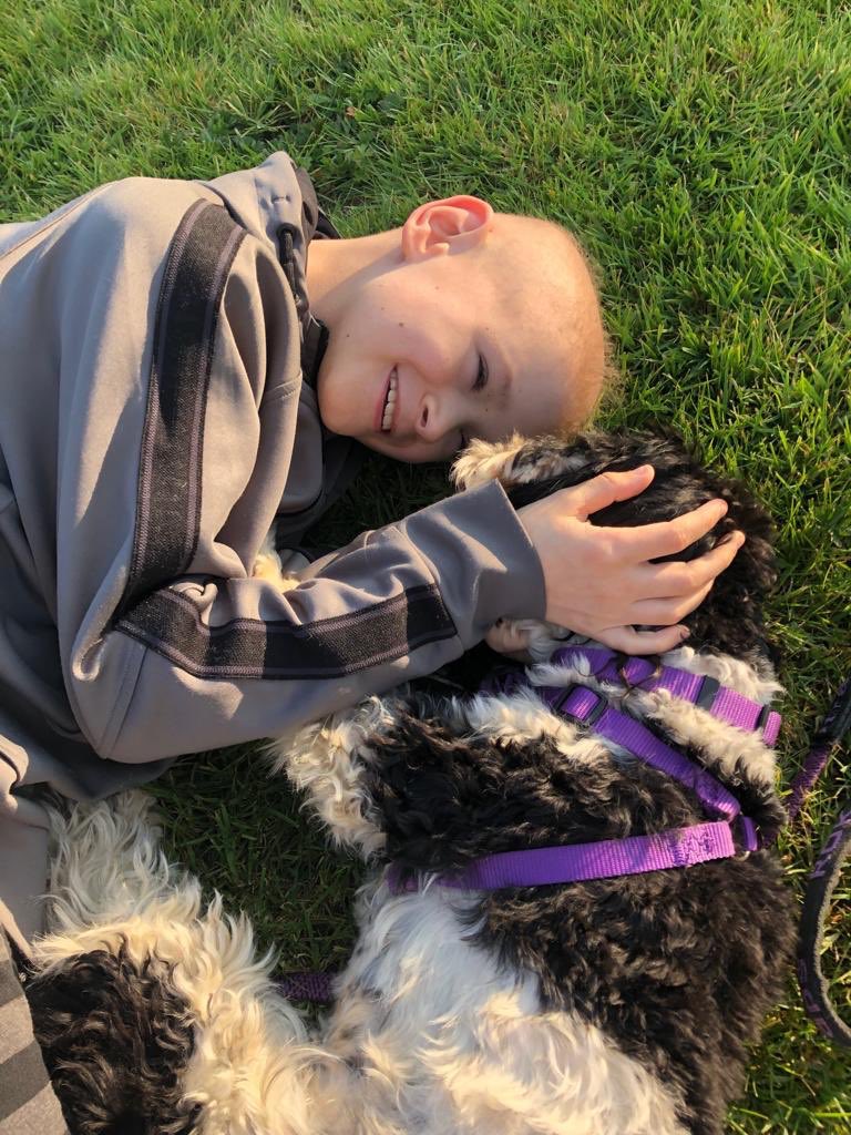 Cookie came into hospital to cheer Harry up.  It worked. Lots of smiles