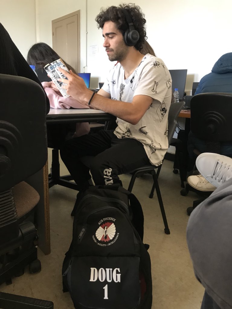 KarimWehbe20's tweet photo. @NicholasDoghla1: An architect -reading a book - while listening to music - with his football kit bag by his side. Just a typical AUB student, on a typical day, in a typical #ENGL256B3 class. #Multitasker #Multiskilled #Multimania https://t.co/Pig43ieYiF