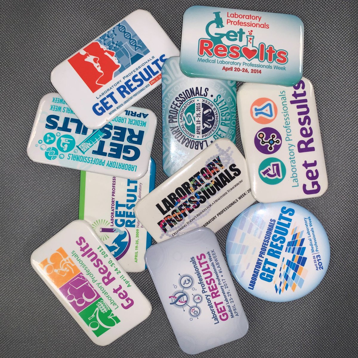 americanmedtech's tweet photo. Lab week pins from the last 10 years. Do any of you collect these like we do? #AMTlabweek #LabWeek https://t.co/YxohDHP3r7