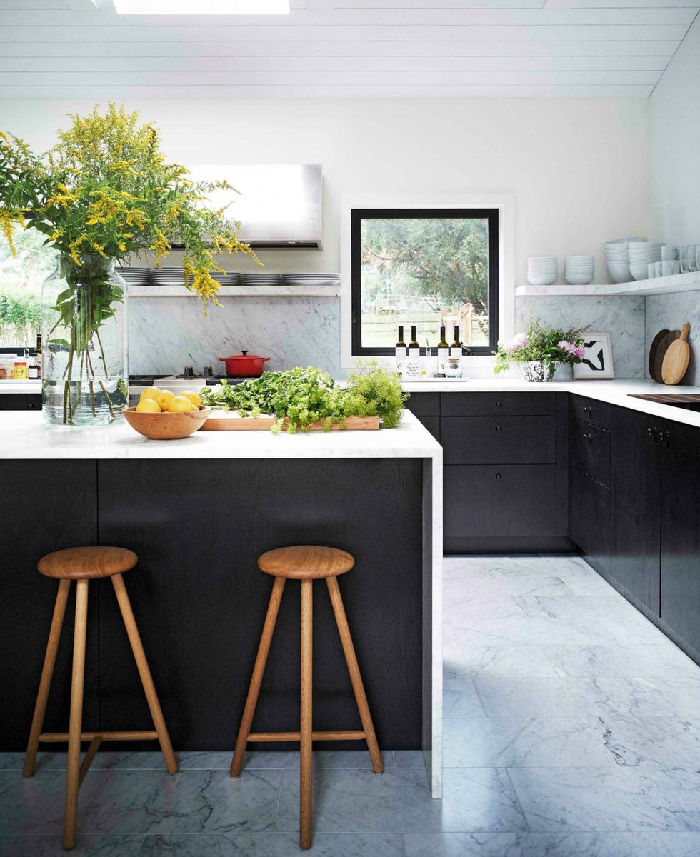 Don't be afraid to go marble crazy. The slabs of barely gray honed Carrara marble covering the kitchen make for a clean, airy look. 

#Kitchenremodel #kitchengoals #kitchensoftwitter #kitcheninspiration #kitcheninterior #kitchenideas #modernkitchen #kitchenstyle #kitchenlove