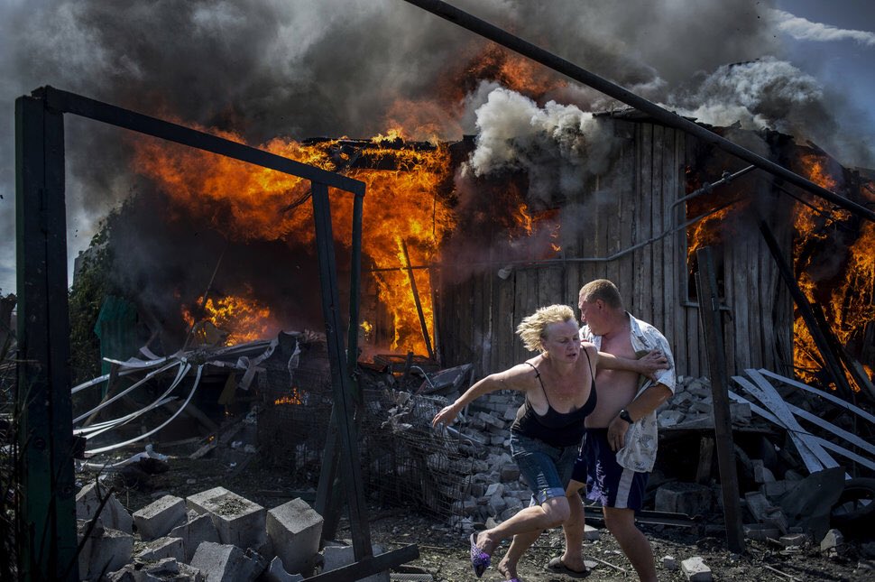 CondensedP's tweet photo. Civilians Escape from a Fire

Civilians escape from a fire at a house destroyed by an air attack in Luhanskaya village, Ukraine.
#photojournalism

Photo by: Valery Melnikov https://t.co/FU4MFEGyvR