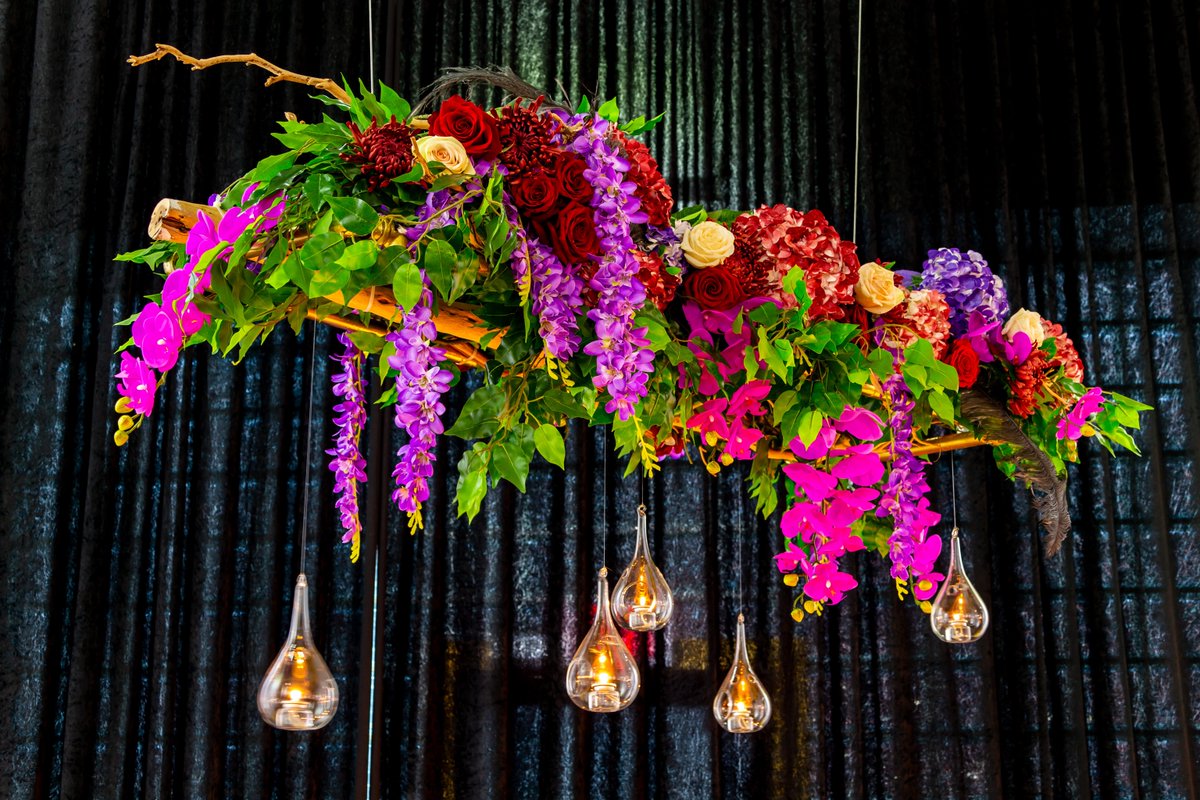 This delightful hanging structure was part of Jas and Chris big day, so bright and colourful! 🌺😍 Photo by Henry Lin