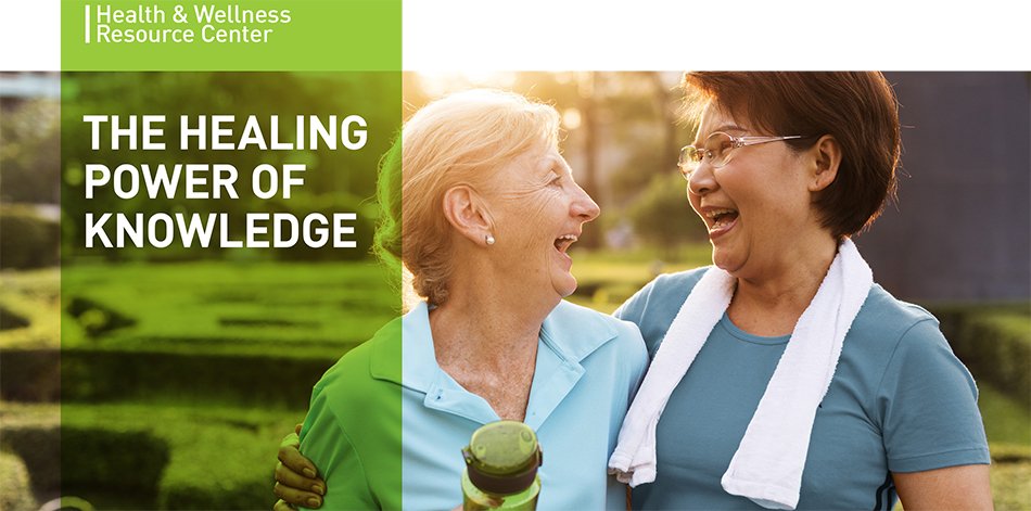 two older woman facing each other smiling, smiling at one another