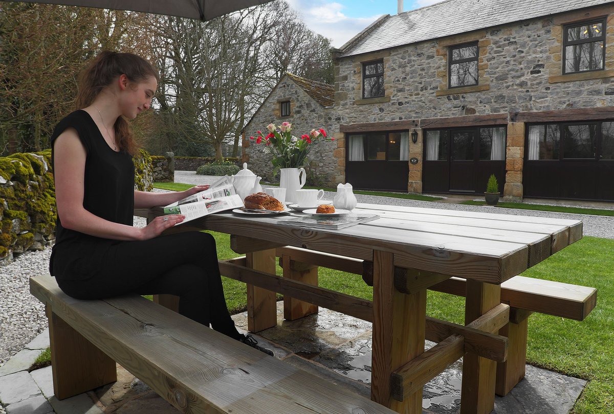 Relaxing in the newly landscaped cottage garden.