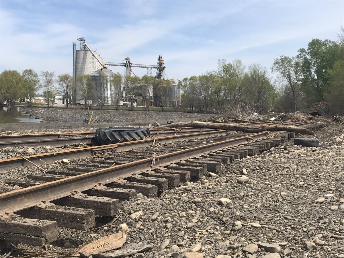 BetsyJibben's tweet photo. Hamburg, IA - I had no idea the town still looked this bad. There are destroyed buildings, sandbags left, busted bins and standing water. Hard to swallow. https://t.co/SMFM9d0hYI