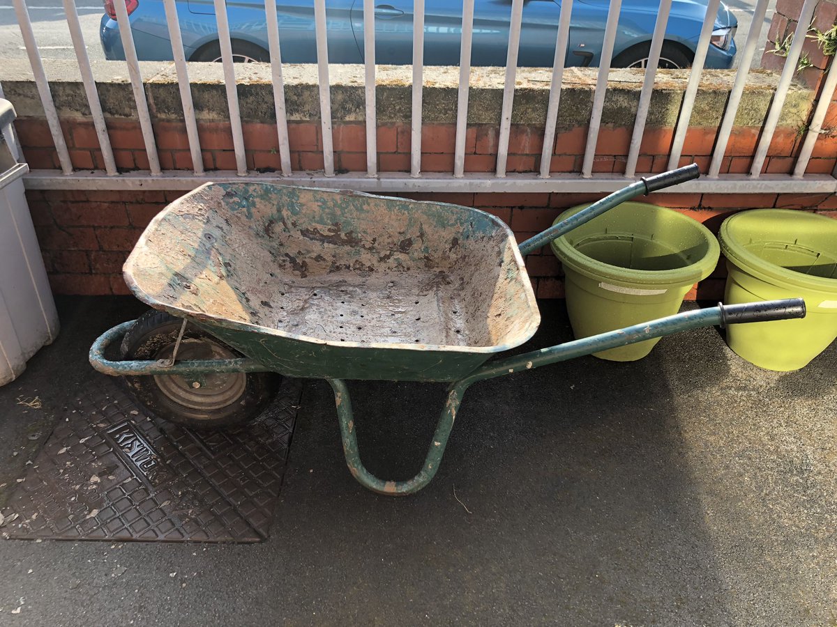 MissEngland6's tweet photo. Our before picture of @NavigationPS meal in a wheelbarrow competition with @AltyinBloom. Gardening club are very excited to get started! Holes have been drilled and we are ready to put the soil in tomorrow! #watchthisspace https://t.co/s5bugOH3bR