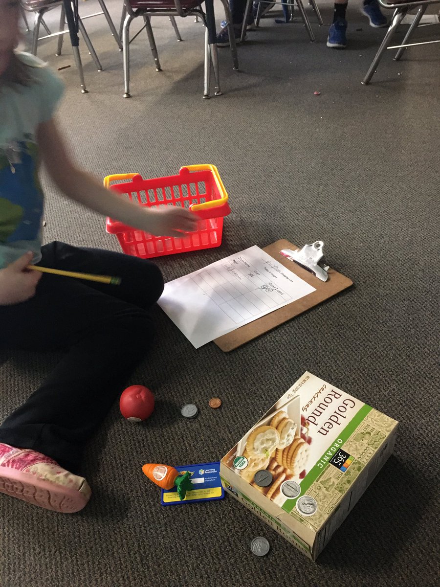 Practicing with money at our classroom store! #oakststories