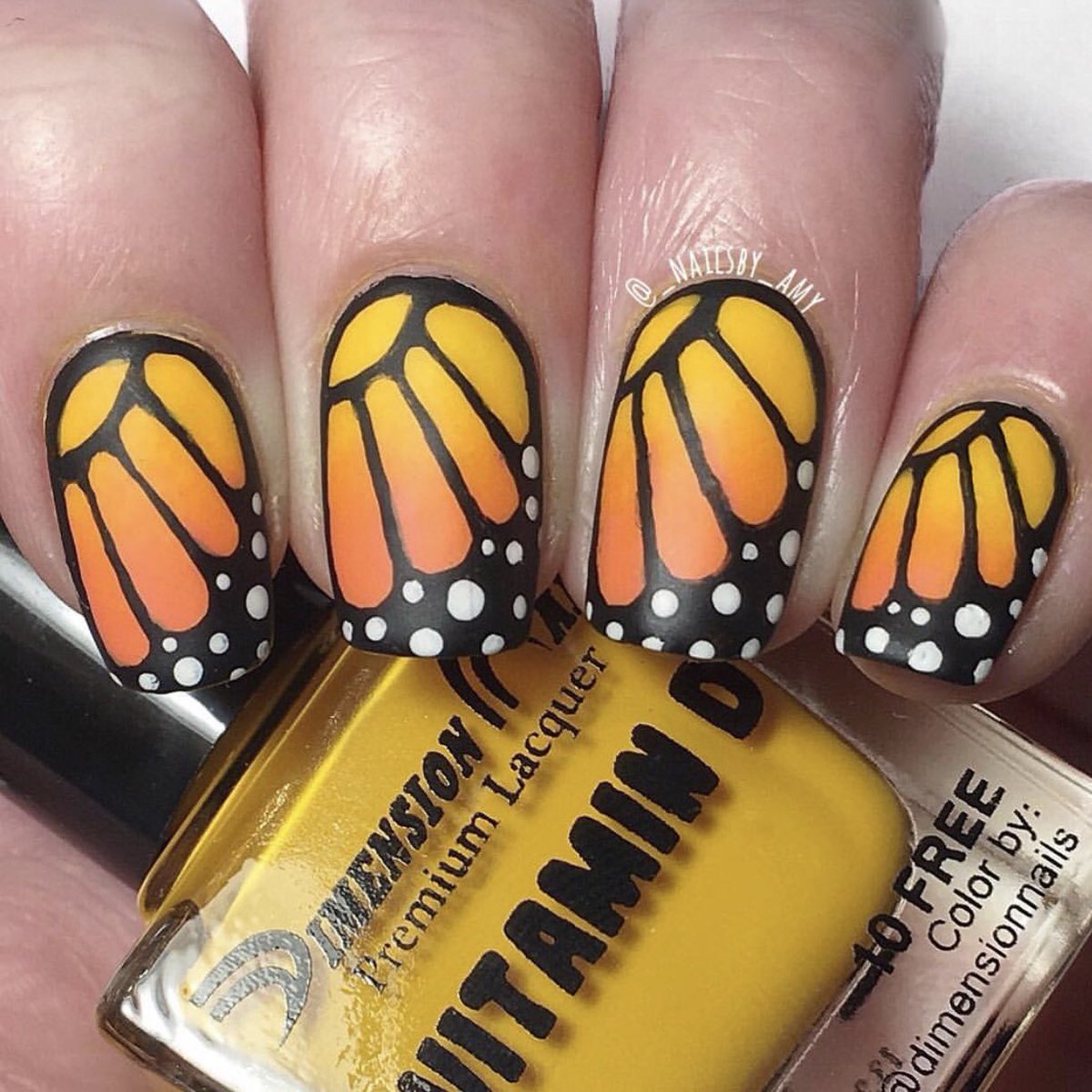 Beautiful Monarch butterfly nails by @_nailsby_amy 😱😍🦋 Wearing our sunny Vitamin D lacquer. #vega #CrueltyFree #nailpolish