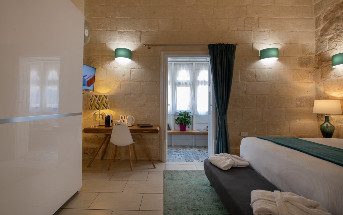 JulesyBnB's tweet photo. Looking to stay in a room with a classic modern retro feel, complete with your own balcony reading nook, a full mini bar, coffee machine and many other complimentary surprises?

Then Book The Manoel Suite at Julesy's BnB -->> https://t.co/Rbl8p8OcYS
#Malta https://t.co/pwwTrXpTjj