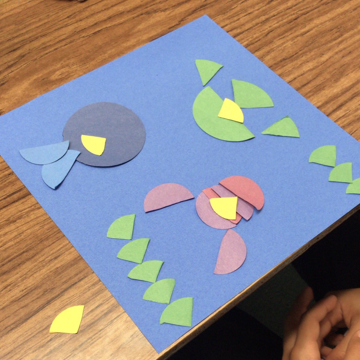 MsKumabe's tweet photo. .@KumabesCoyotes taking inspiration from Ed Emberleyโs โPicture Pieโ Book to make these Fraction Fish. Love connecting math & art to create these masterpieces! ๐ โ๏ธ @IRaCoyote #CoyotesConnect #CoyotesCreate https://t.co/WyCCIy0YkQ