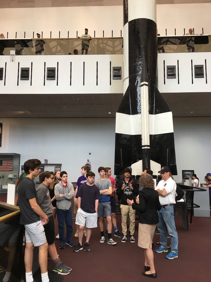 RobinGallaher1's tweet photo. Carrboro High students in front of a WWII rocket used against the allies. https://t.co/445QMDDCUV