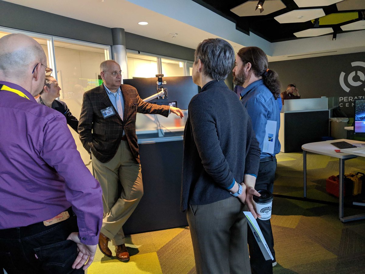 Internet2's tweet photo. UETN's CTO Jim Stewart gives members of Internet2's Trust and Identity team a behind-the-scenes tour this morning @uennews @InCommonUS @knucklehead @hawthornewest https://t.co/ZD0q6G84ei