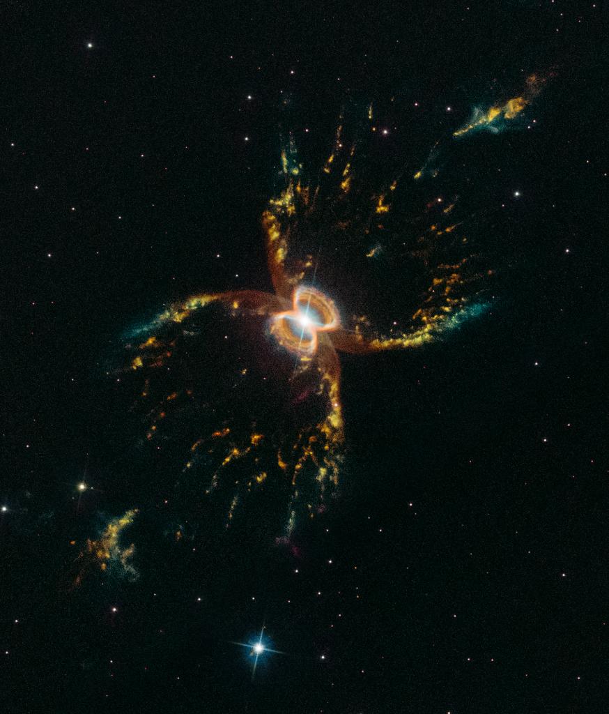 We're celebrating 29 years since the launch of <a href="/NASAHubble/">Hubble</a> with a new look at the Southern Crab Nebula! 

See the nebula's hourglass structure ⏳, with bright edges like crab legs 🦀 ? It was shaped by a binary system of stars at the center. More: go.nasa.gov/2GuXZqV