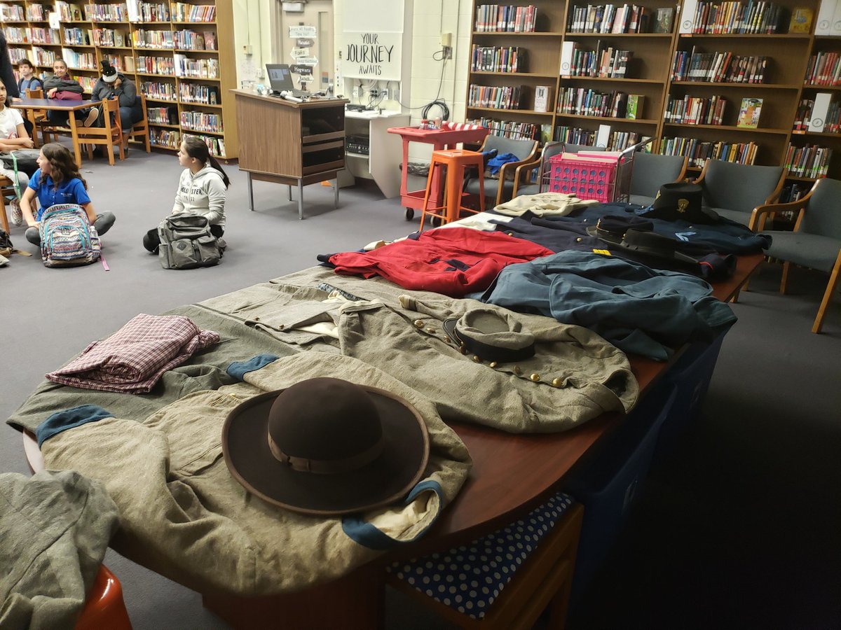 Cahillmomof6's tweet photo. Learning from our own Mr. Forsythe about weapons, uniforms and artifacts from the Civil War. @DMS_CHARGERS #ChargerPride #DMSisWhereItsAt @inge_rick https://t.co/Wy91klTS4d