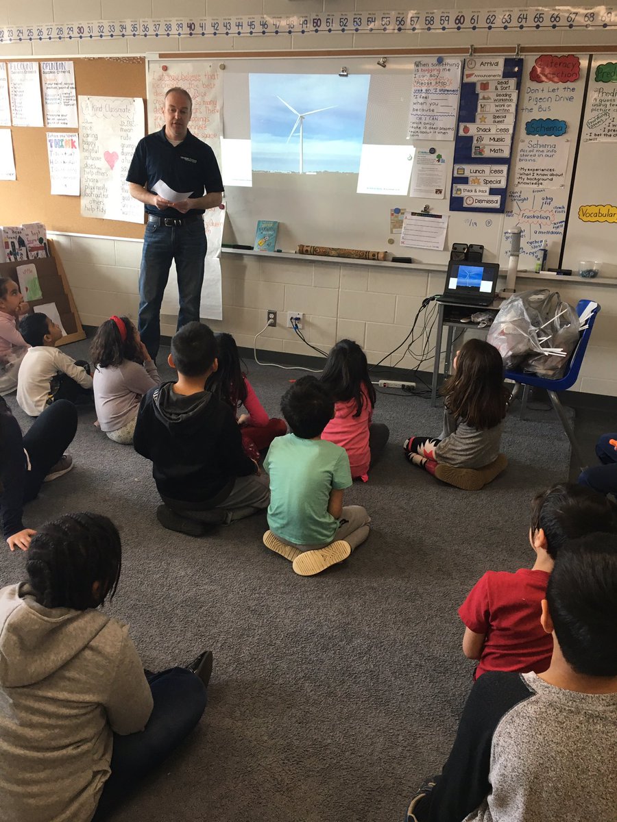 Mrs_M_Snider's tweet photo. An engaged group of Grade 2 students learning about renewable energy and wind turbines! Thanks @david_hickey50 and @SiemensGamesa #expertsintheclassroom #OODinsidetheeaglesnest https://t.co/KDbWuR5CCP