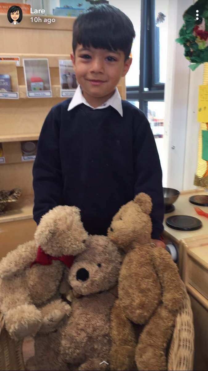 Lawey is with three bears.