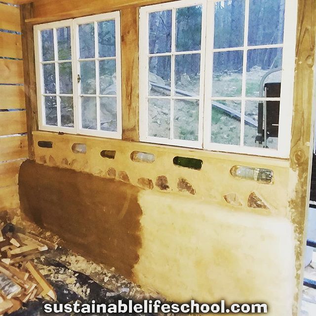 SusLifeSchool's tweet photo. Here's the inner wall of our wood shed. The bottom part of the wall is #earthbag. The next part is #cordwood and #bottlewall in #cob that we built during our last workshop. The windows were acquired for free off of craigslist. The wood is inexpensive wood from local saw mill… https://t.co/9lTEIk3JNg
