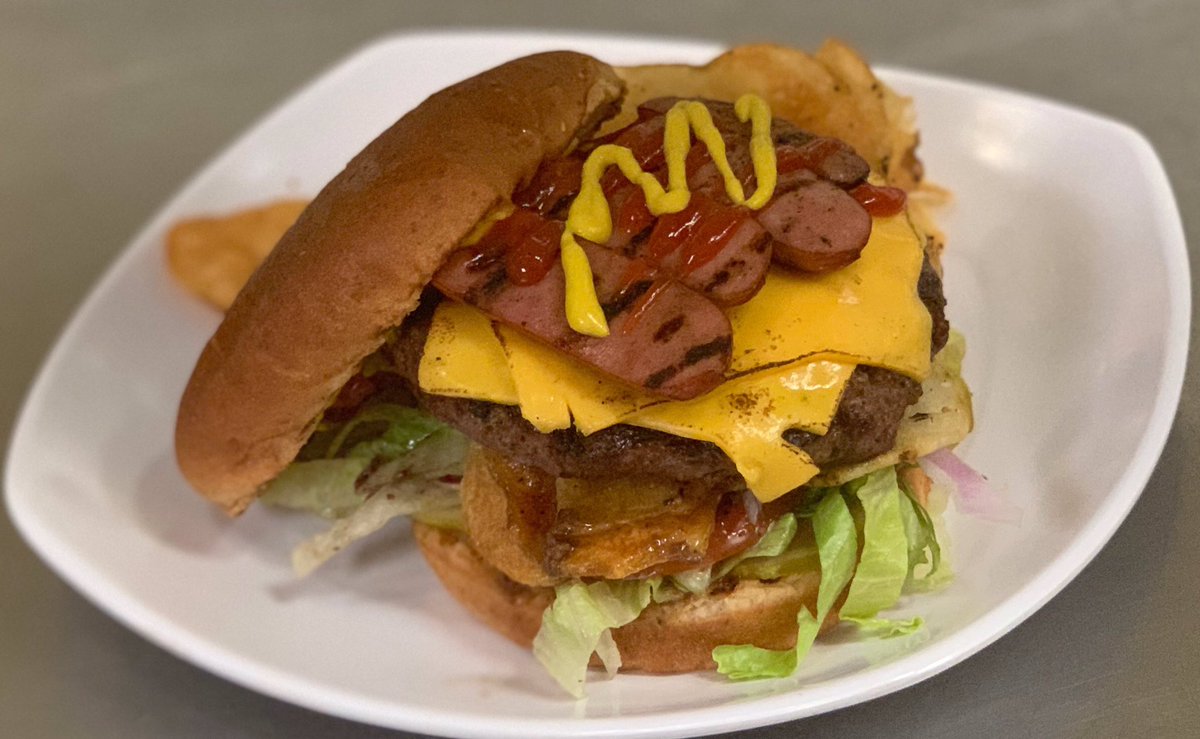 RevsBarAndGrill's tweet photo. “The ‘Merica” - local beef burger, grilled hot dog, american cheese, potato chips, ketchup, mustard, lettuce, tomato, onion, pickle https://t.co/5IptuJfoV3
