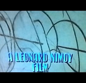 A still from the opening credits of Three Men And A Baby that reads "A Leonard Nimoy Film".
