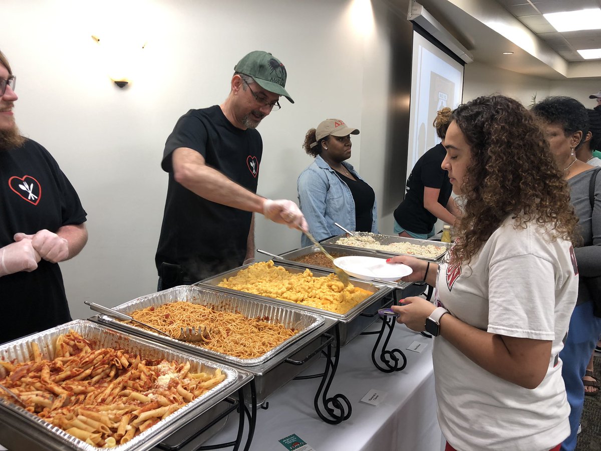 MarshallUHonors's tweet photo. Dr @hoey_ethno gets in on the Mac and cheese action at #projectfeedhuntington. Dinner is free until 8, in the MSC, Room BE-5. 100 meals already served! https://t.co/JzSgWhHtS0