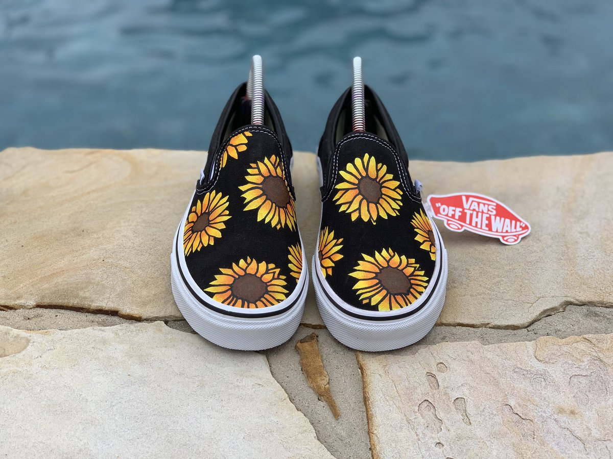 white vans with sunflowers