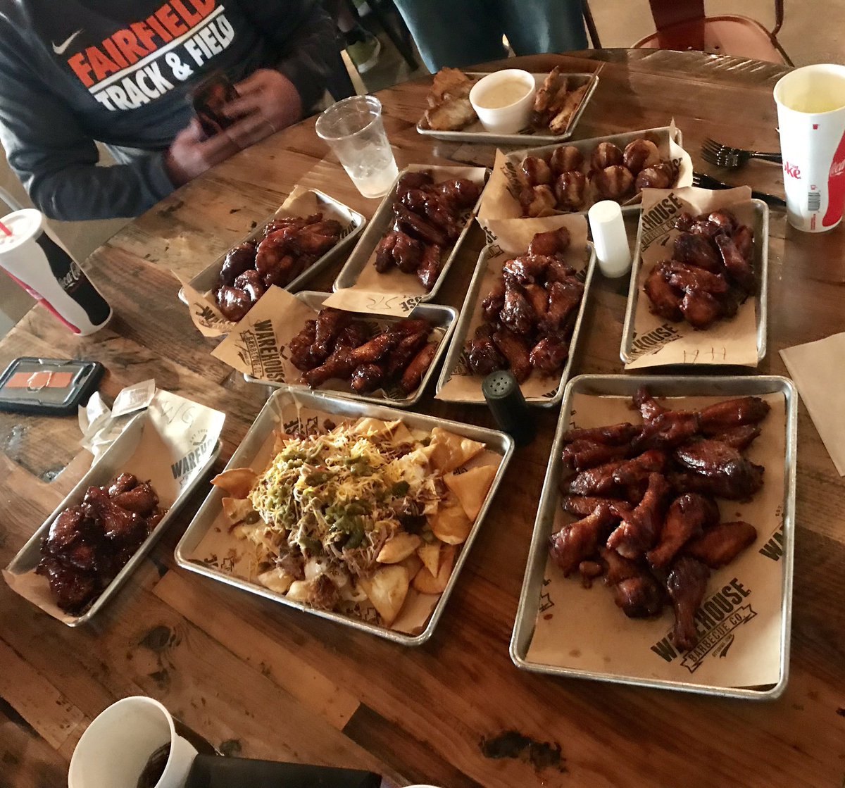 FFTrojanTrack's tweet photo. Track staff togetherness tonight after a rare Tuesday off. Hit up Warehouse BBQ in Ottumwa and Dairy Bar in Fairfield. #calories #wingcity #getthenachos #bloomyandbeanservedfast #tippedwell #blackpearl #trackstaff #OneFairfield https://t.co/Tlzd0yWZQl